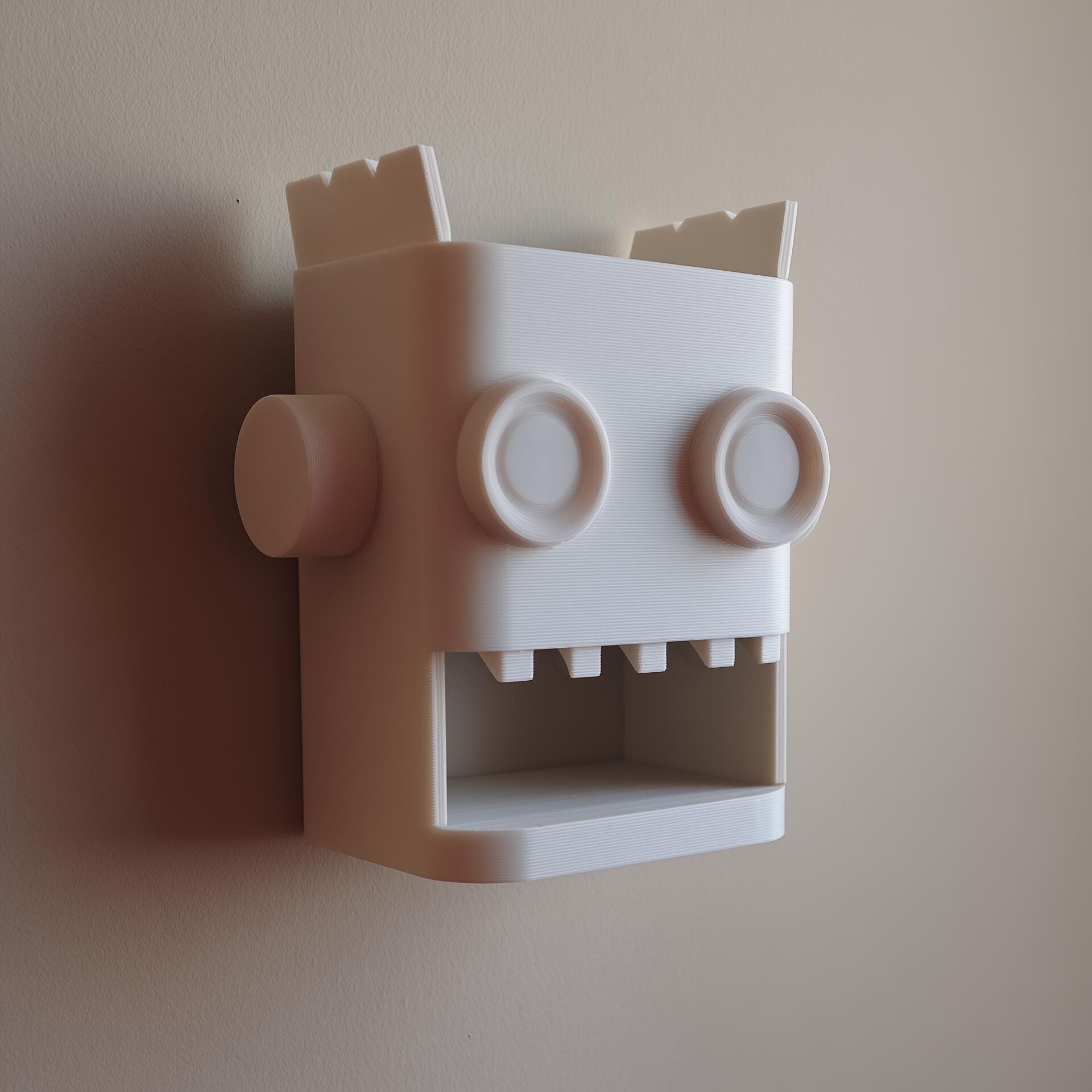 Organiseur mural robot imprimé en 3D